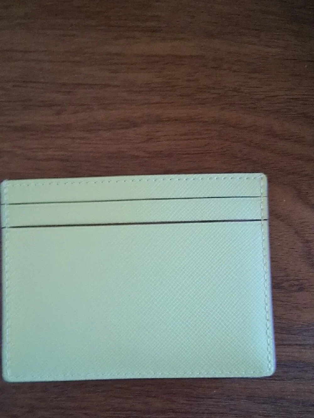 NWT Kate Spade mint green card case with gold logo